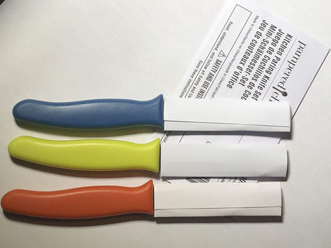 Pampered Chef paring knife set in wooden block for organized storage.