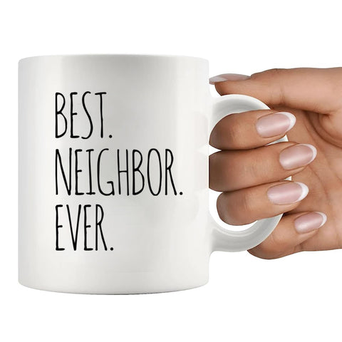 Panvola Best Neighbor Ever mug being held to show comfortable handle.