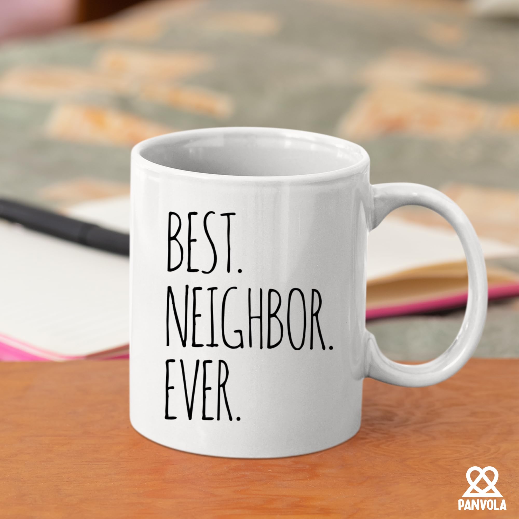 Panvola Best Neighbor Ever mug in a cozy kitchen scene.