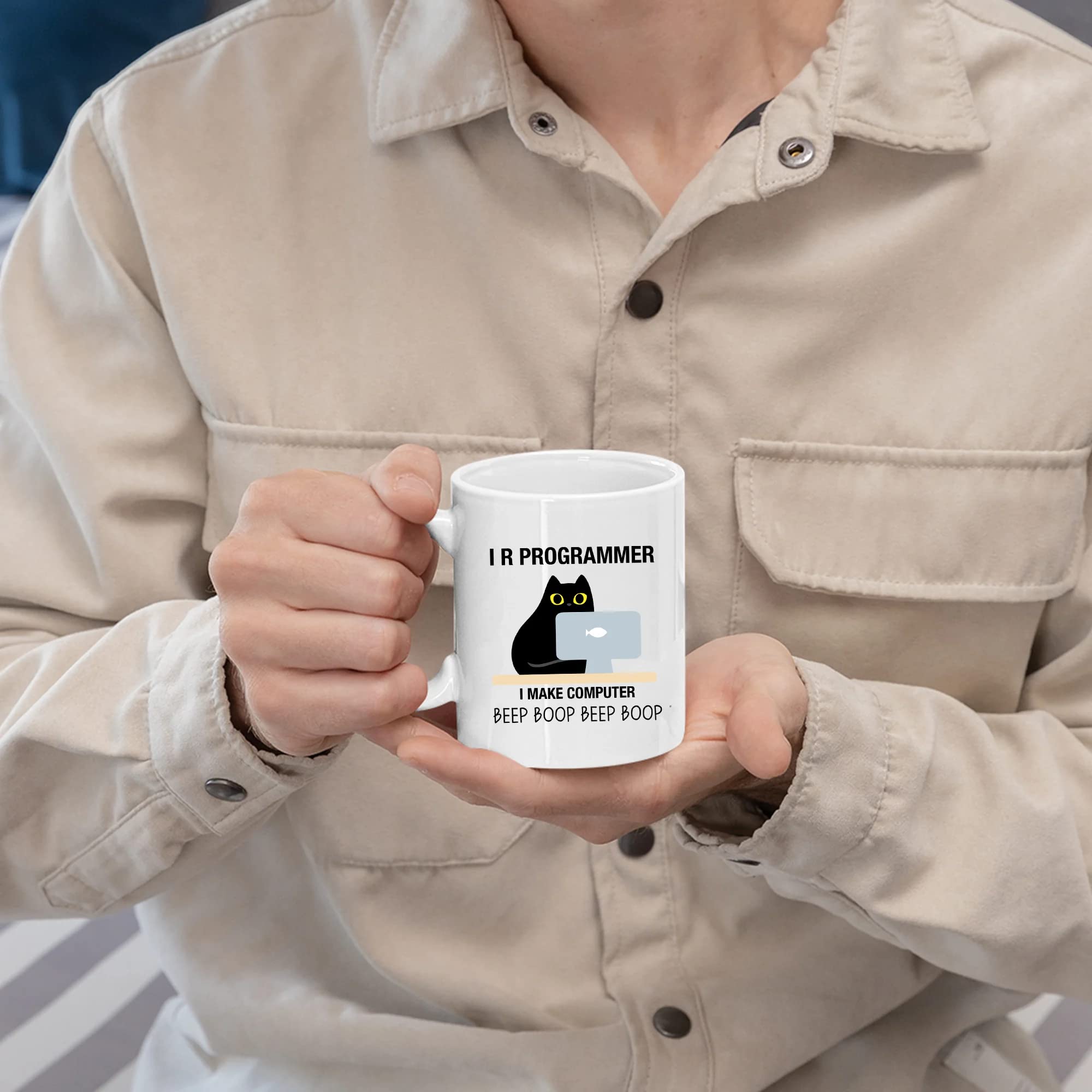 Panvola I R Programmer mug on desk with laptop and notebook
