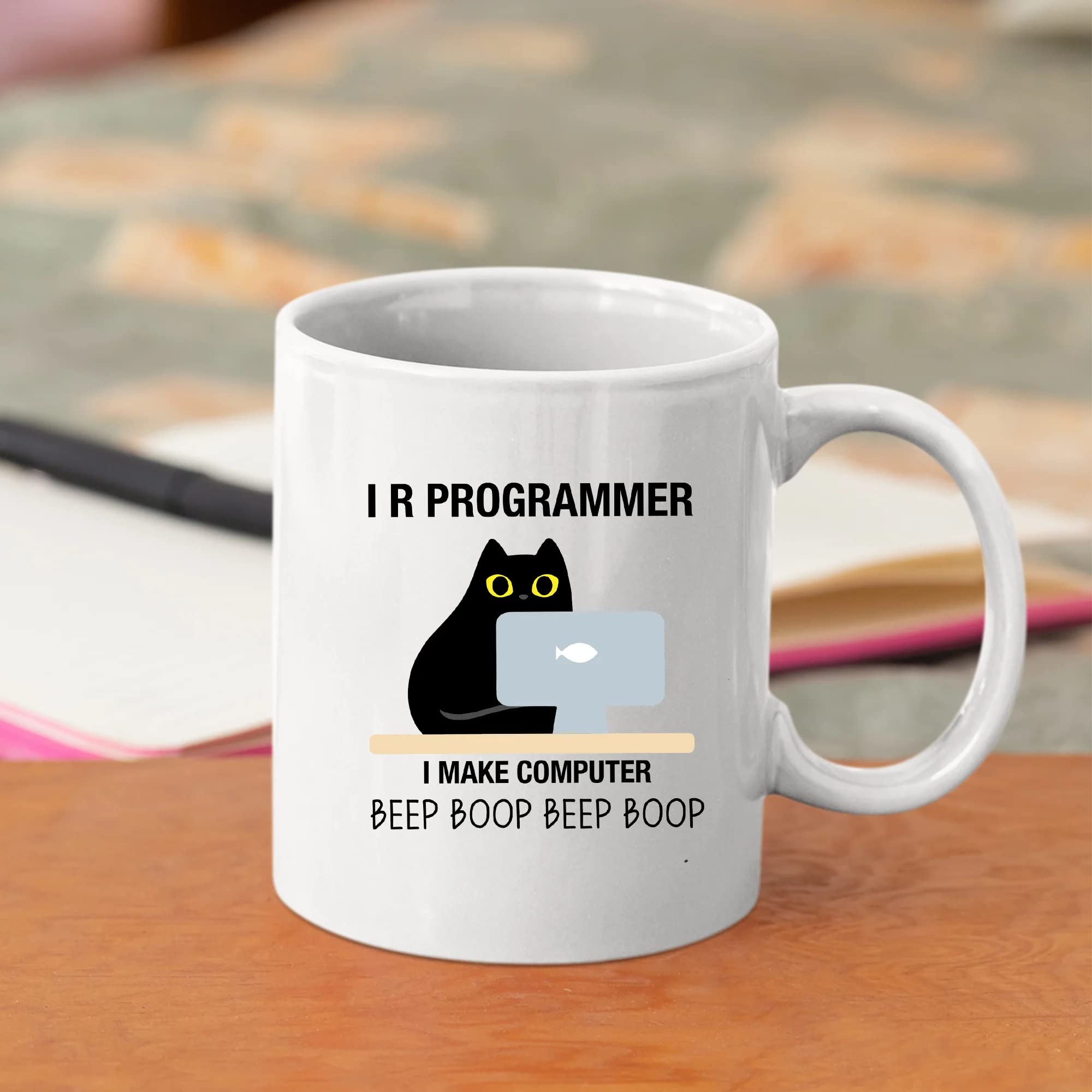 Panvola I R Programmer mug in hand designed as a gift
