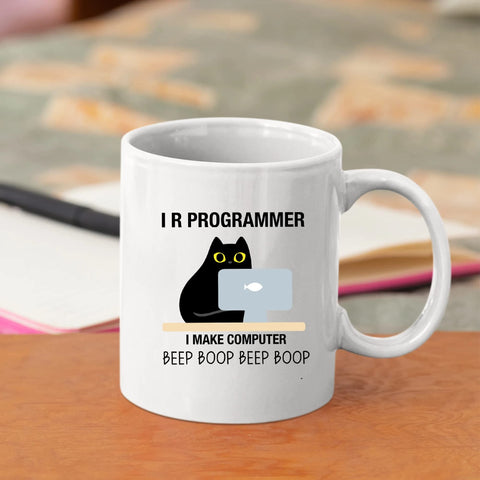 Panvola I R Programmer mug in hand designed as a gift