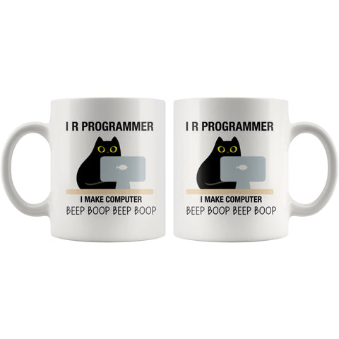 Panvola I R Programmer mug used as pen holder on a desk