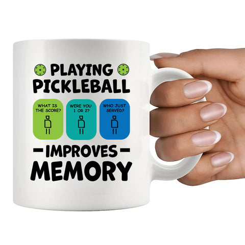 Panvola pickleball memory mug on desk, doubles as pen holder.