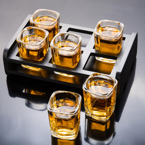PARACITY heavy-base shot glasses provide stable pours for festive gatherings.