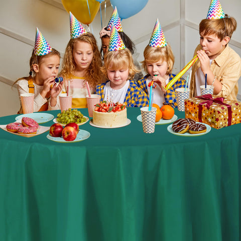 Party Dimensions green round tablecloth folded for quick setup