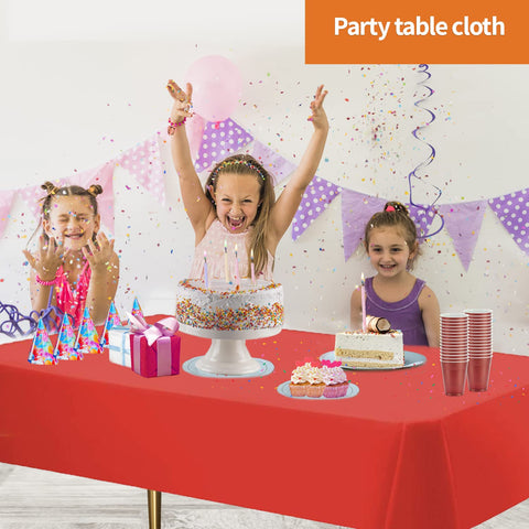 After-event cleanup with Party Dimensions red tablecloth ready for quick wrap-up.