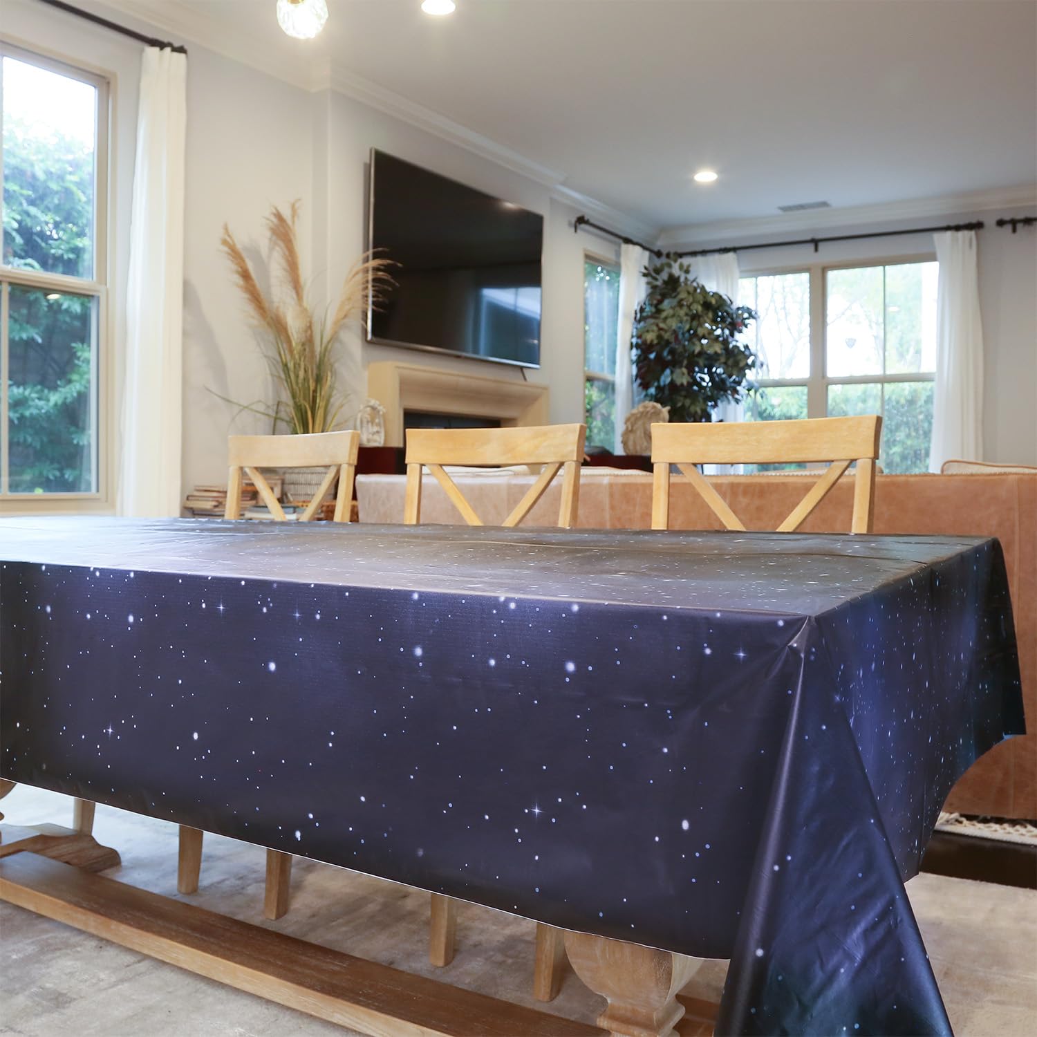 PartyHippo navy star design on tablecloth adds festive touch.