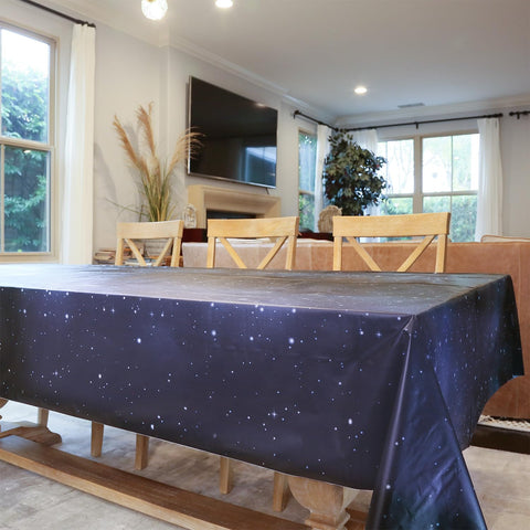 PartyHippo navy star design on tablecloth adds festive touch.