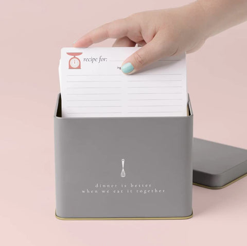 Whisk design printed on cards adds playful detail to the tin.