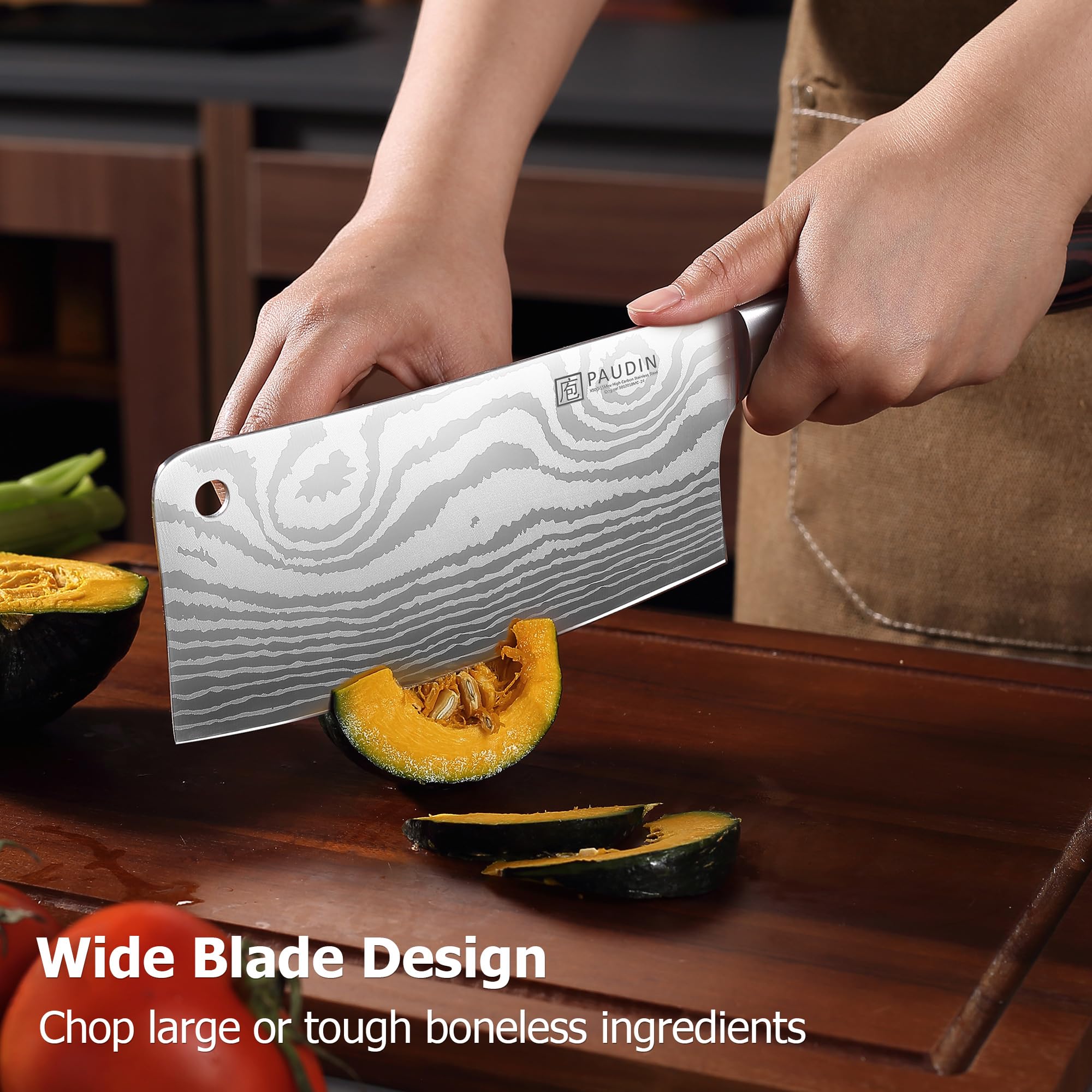 Wide PAUDIN cleaver blade aids deboning and even slicing of large vegetables.