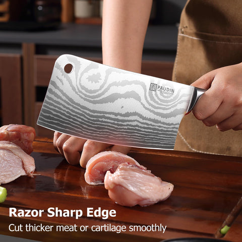 Multipurpose PAUDIN cleaver ideal for meat, vegetables, and fruit prep.