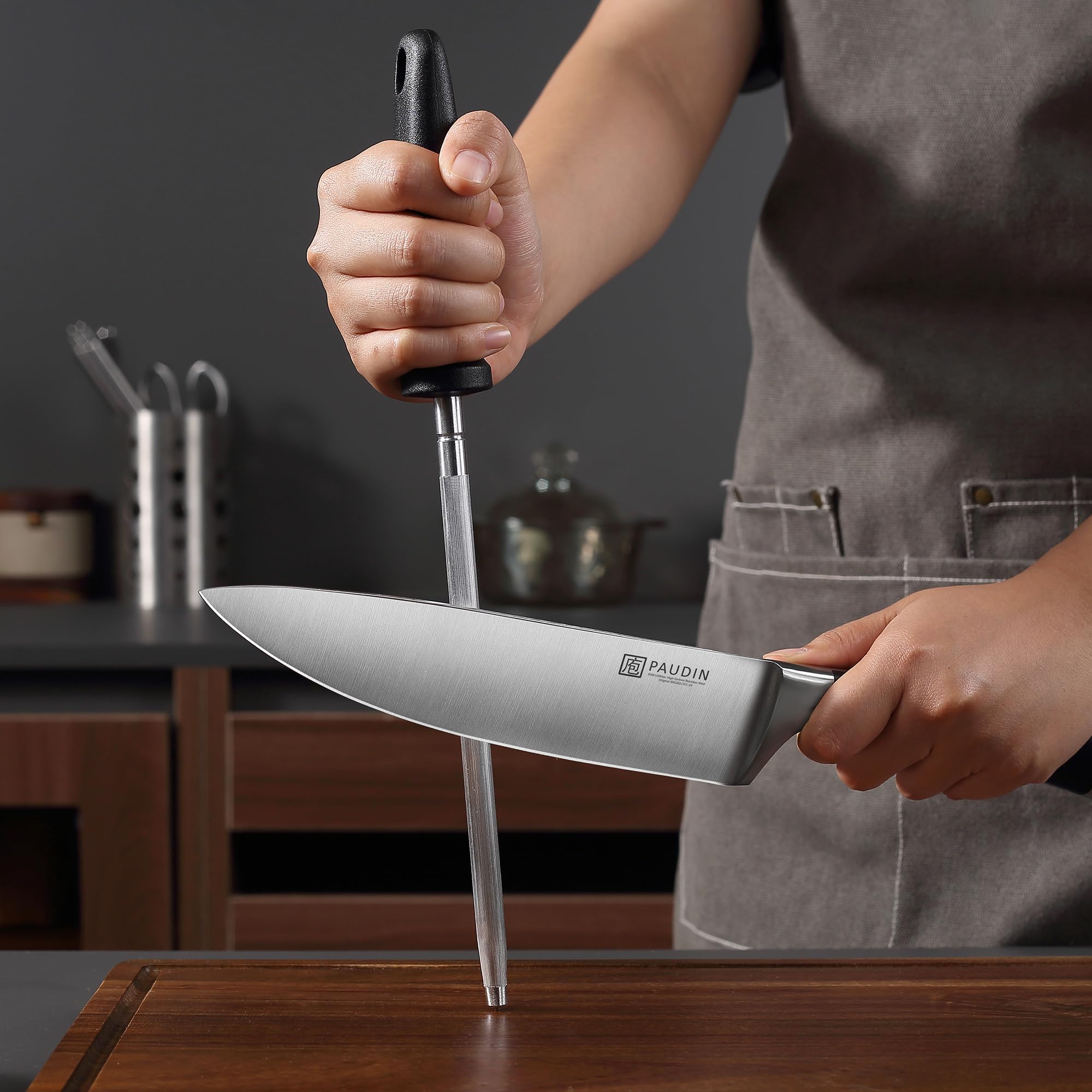 PAUDIN block design with sharpening rod and ventilation helps blade care.