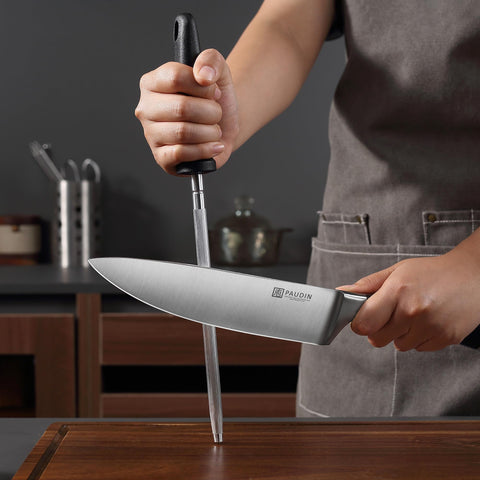 PAUDIN block design with sharpening rod and ventilation helps blade care.
