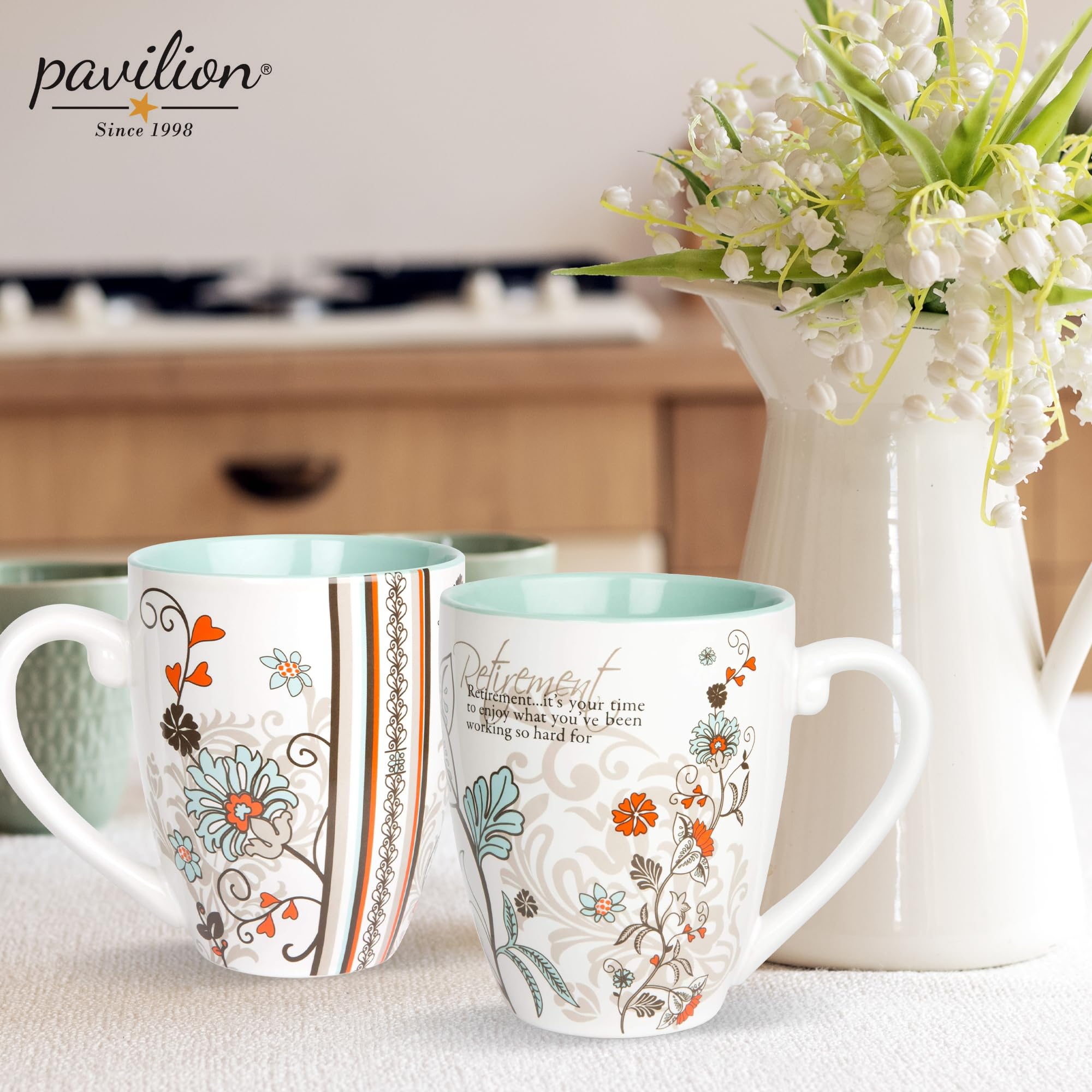 Pavilion mug held in hand for daily use during morning coffee.