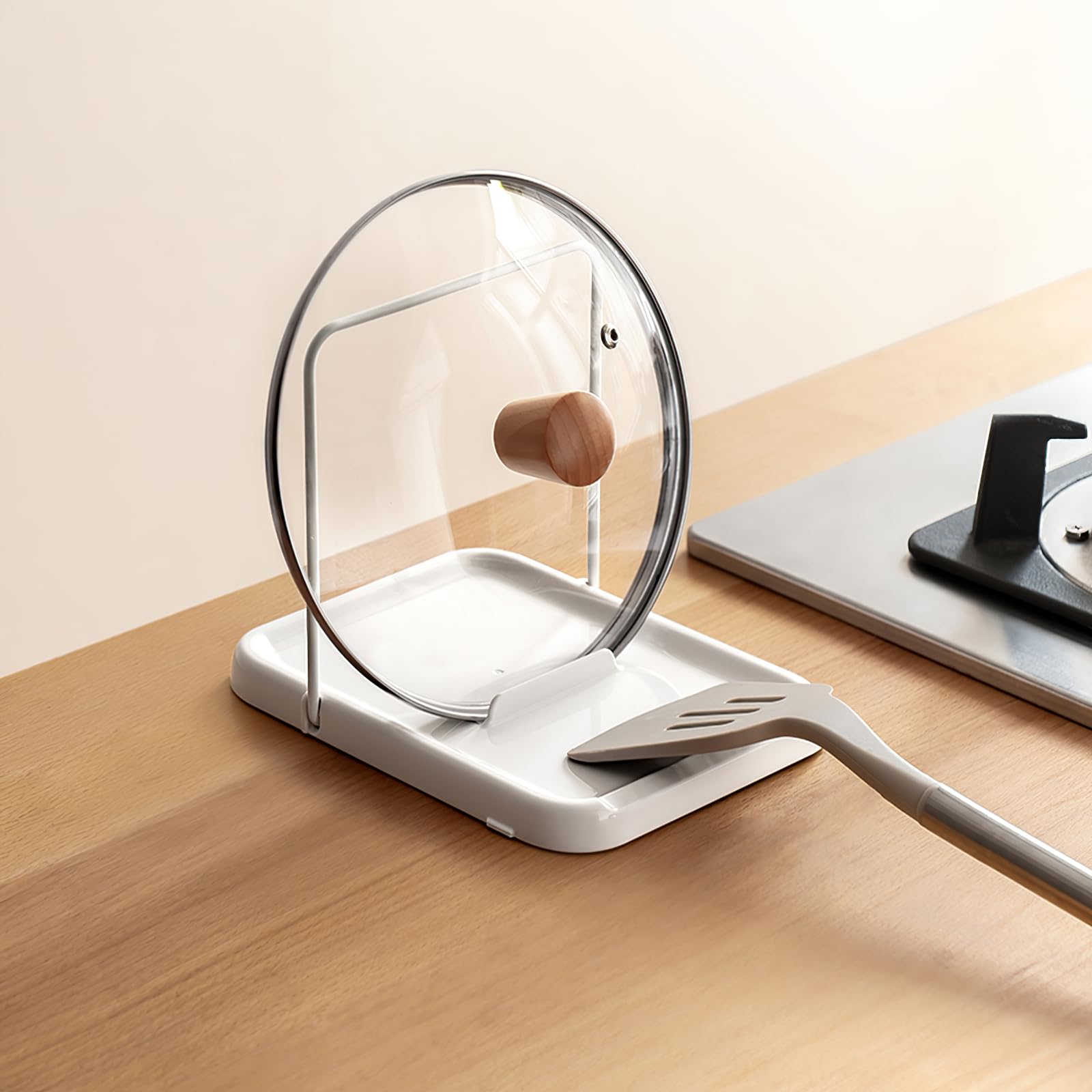 PAVSTINE pot lid holder on the counter keeps lids organized and within reach.