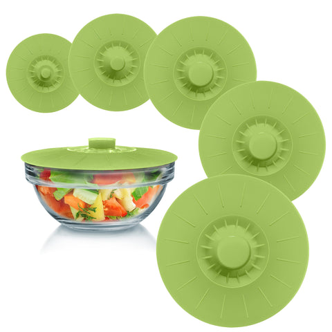 Perfect and Simple green silicone bowl lids on bowls for reusable seal and freshness.