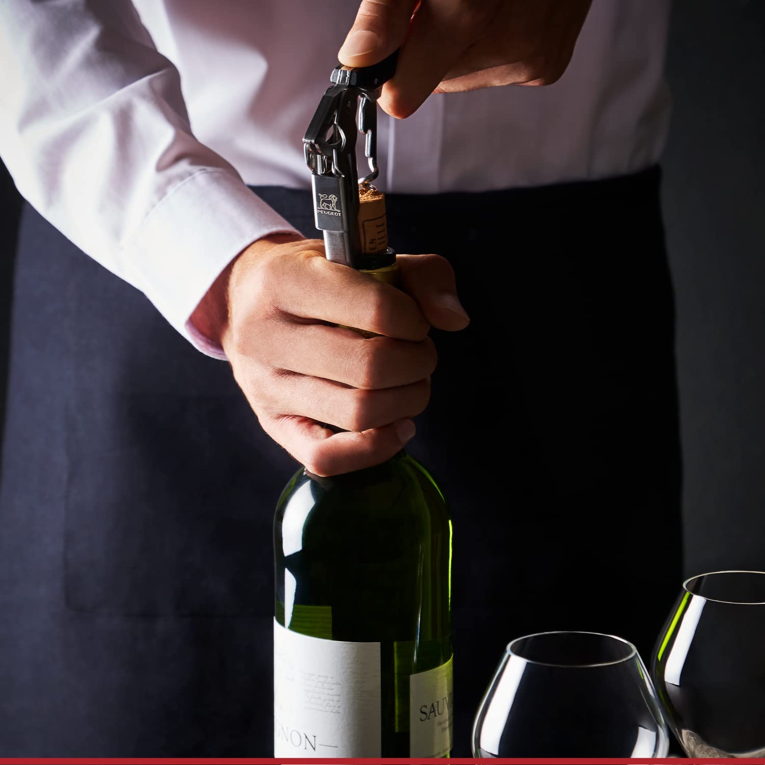 Peugeot Clavelin Sommelier Corkscrew with foil cutter and bottle opener for easy bottle opening.