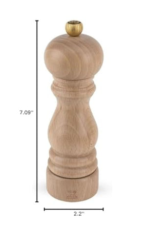 Peugeot pepper mill in action delivering aromatic pepper with two-stage grinding.