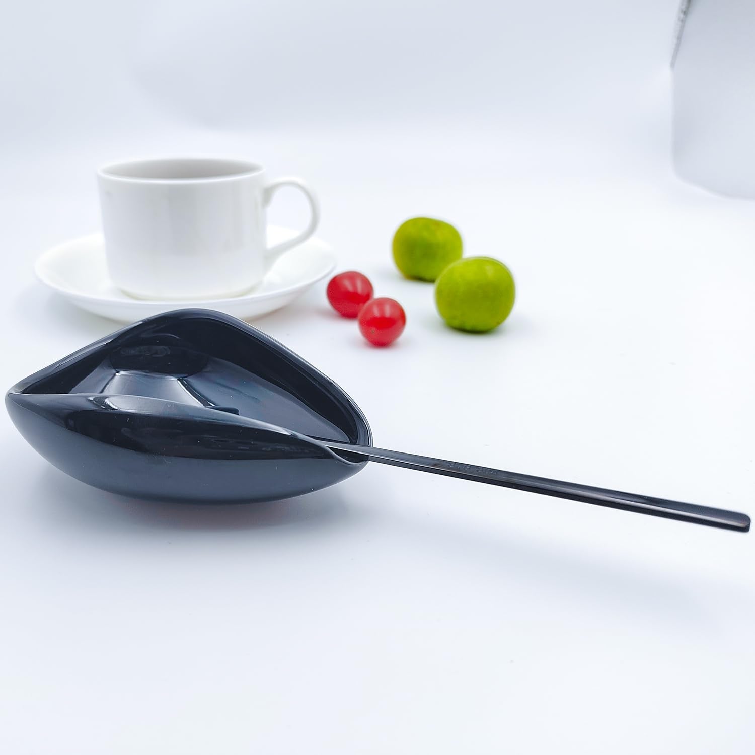 PFCTRJR spoon rest with spoons keeps tea and coffee prep organized.