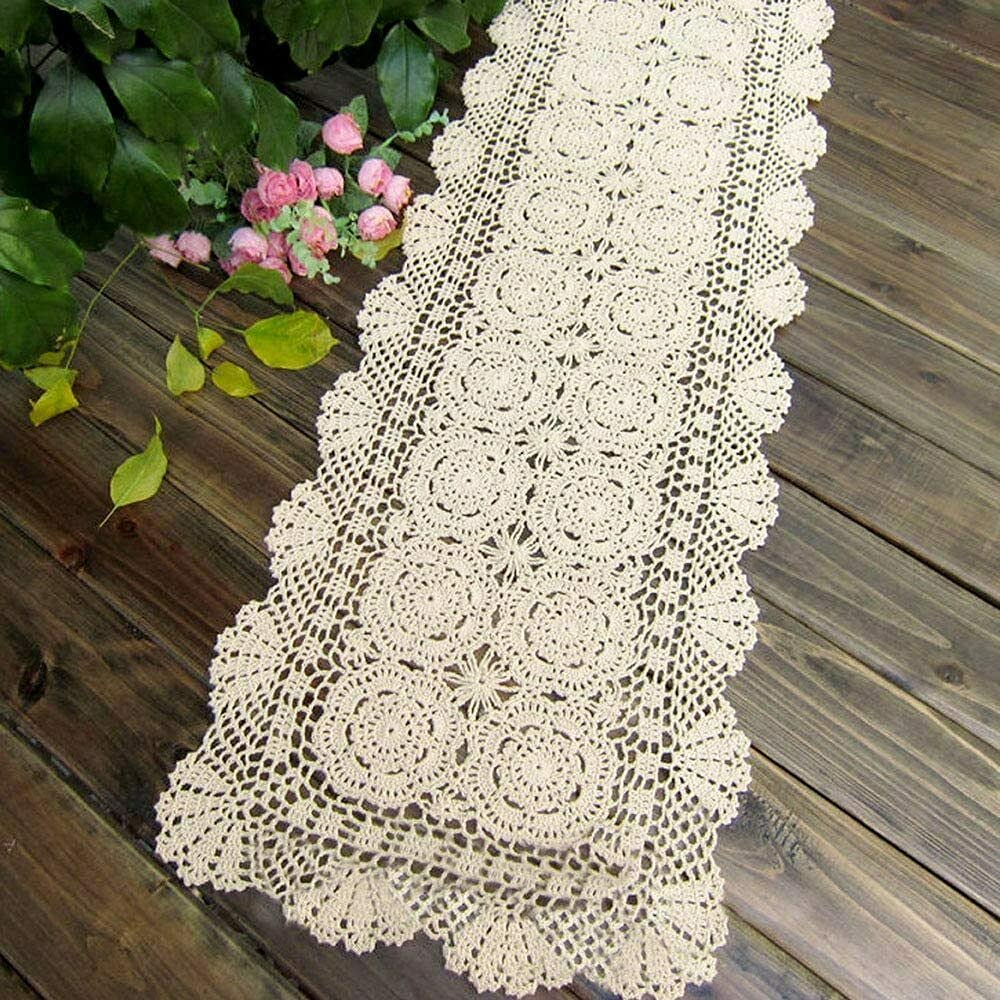 Phantomon lace table runner in beige crochet adds vintage charm to dining tables.