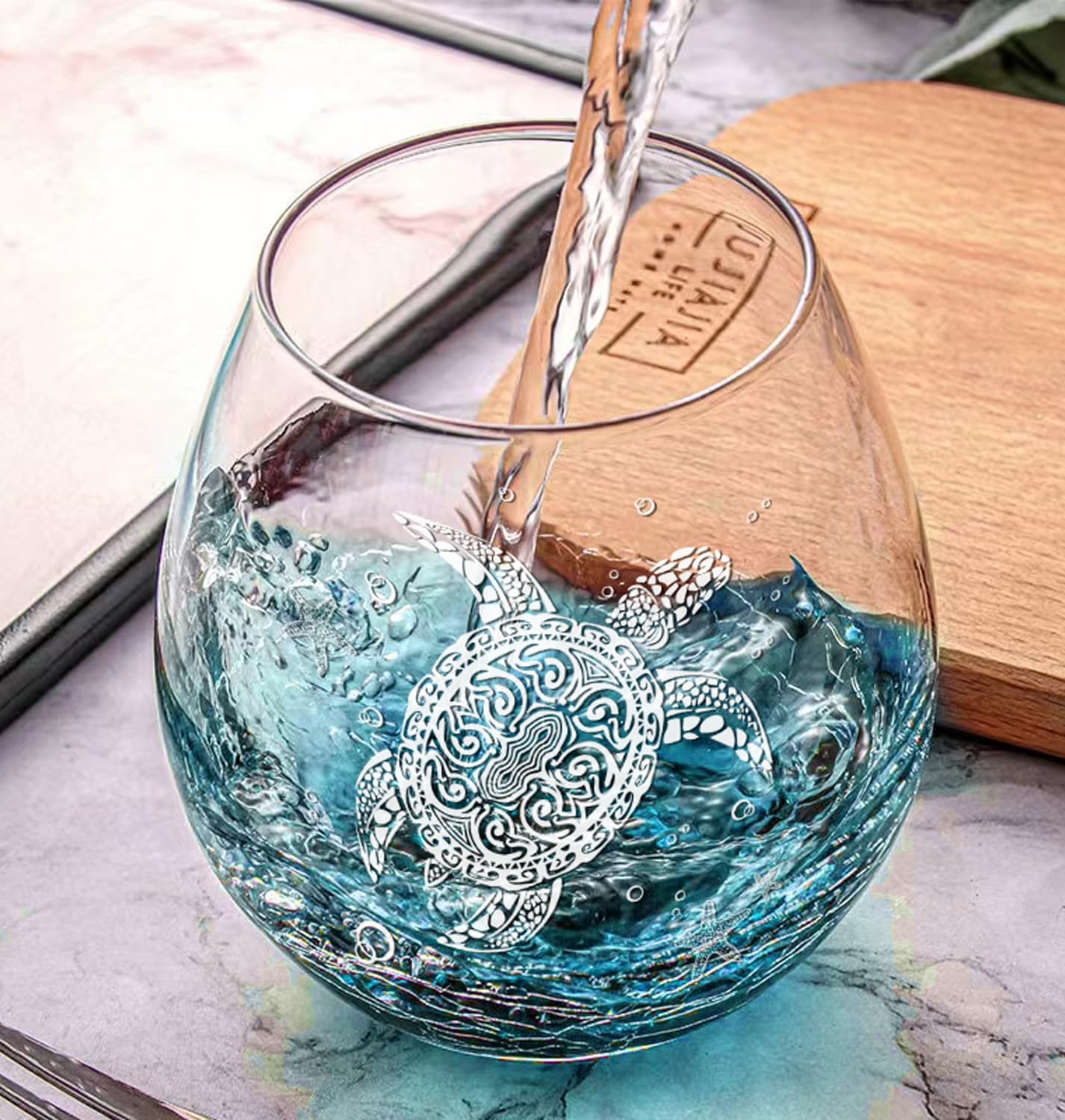 Physkoa teal sea turtle wine glass crackle design adds coastal flair.
