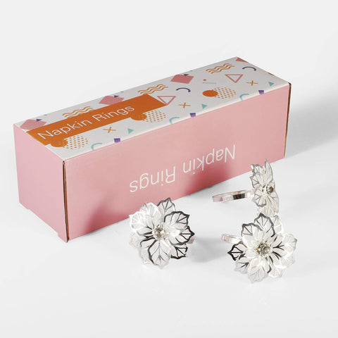 Housewarming gift idea: Picowe napkin ring set in a silver finish.