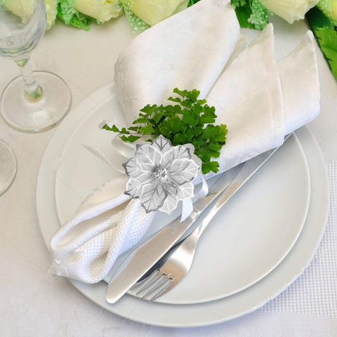 Picowe napkin ring on a dining table with cloth napkins for table decor.