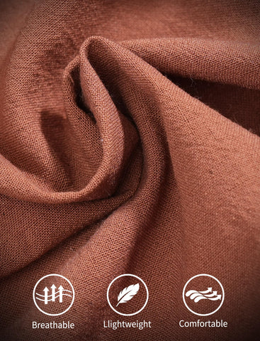Pinknoke full-coverage brown apron protecting clothes during cooking and crafts.