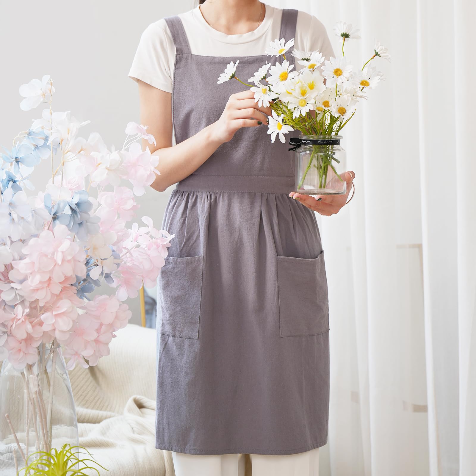 Pinknoke gray apron shows chest coverage at 12.6 inches for added protection.