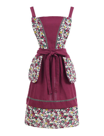 Pinknoke floral pattern kitchen apron enhances feminine style while cooking and baking.
