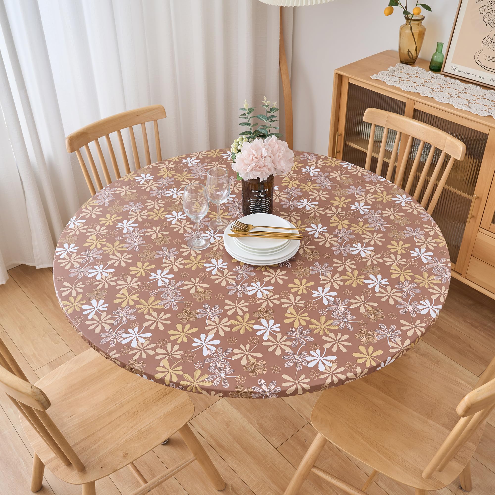 Pioggia round tablecloth with flannel backing protects surfaces while dining