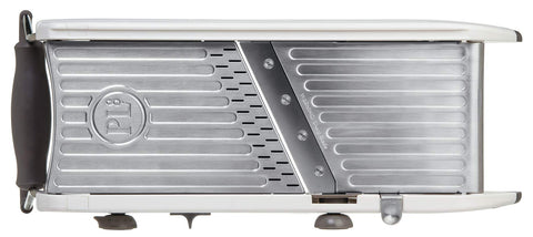 PL8 safety hand guard protects fingers while slicing smooth produce.