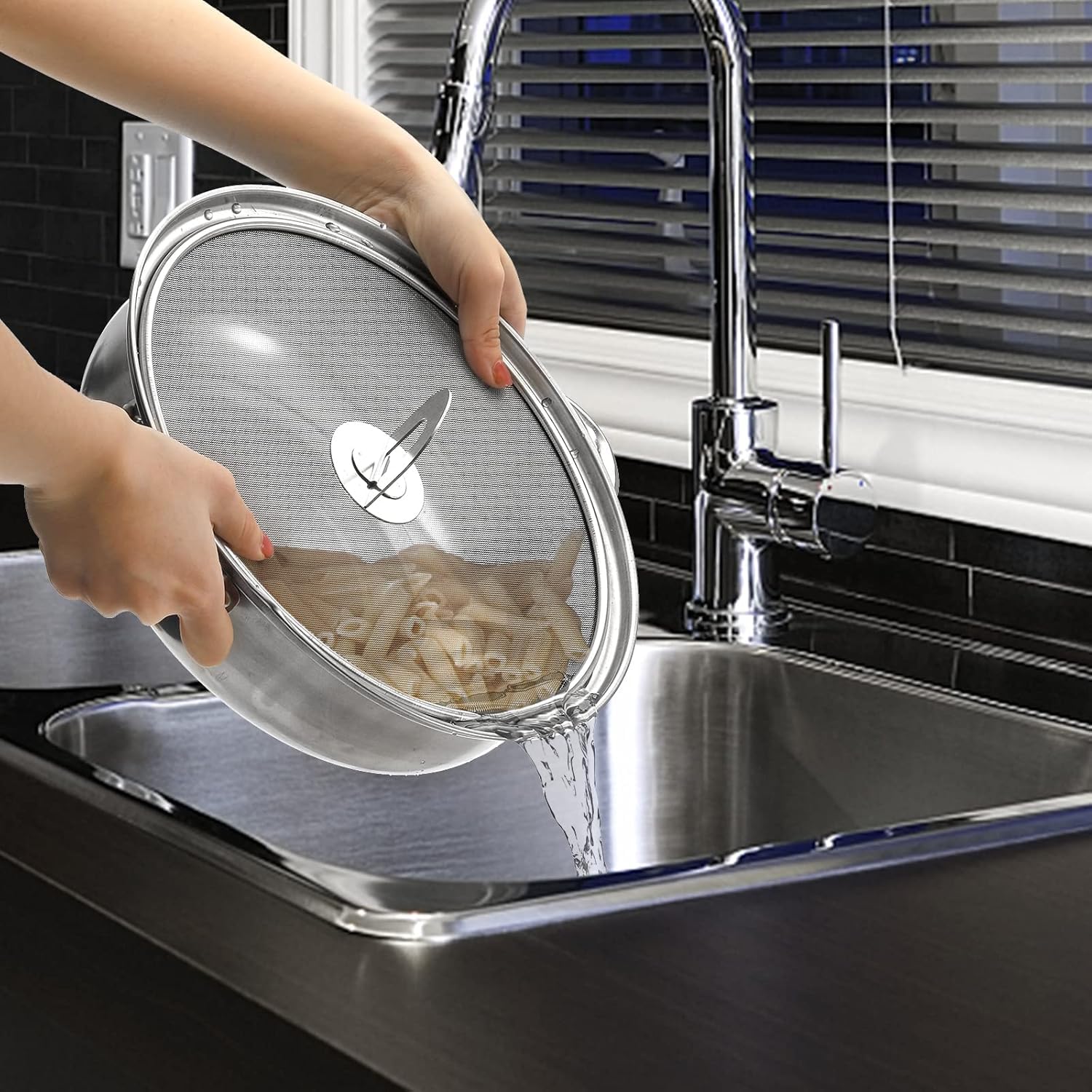 PLACHIDAY 11.5-inch perforated mesh splatter screen in use on a large pan.