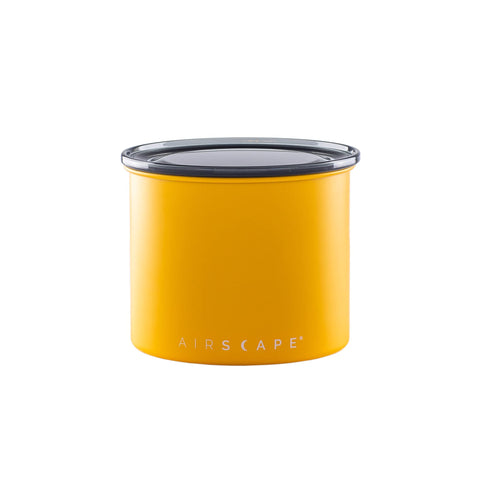 Planetary Design Airscape canister lid in action, pushing out air for freshness.