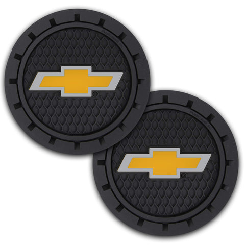 Close-up of Plasticolor bowtie coaster in black, stylish car interior accessory.