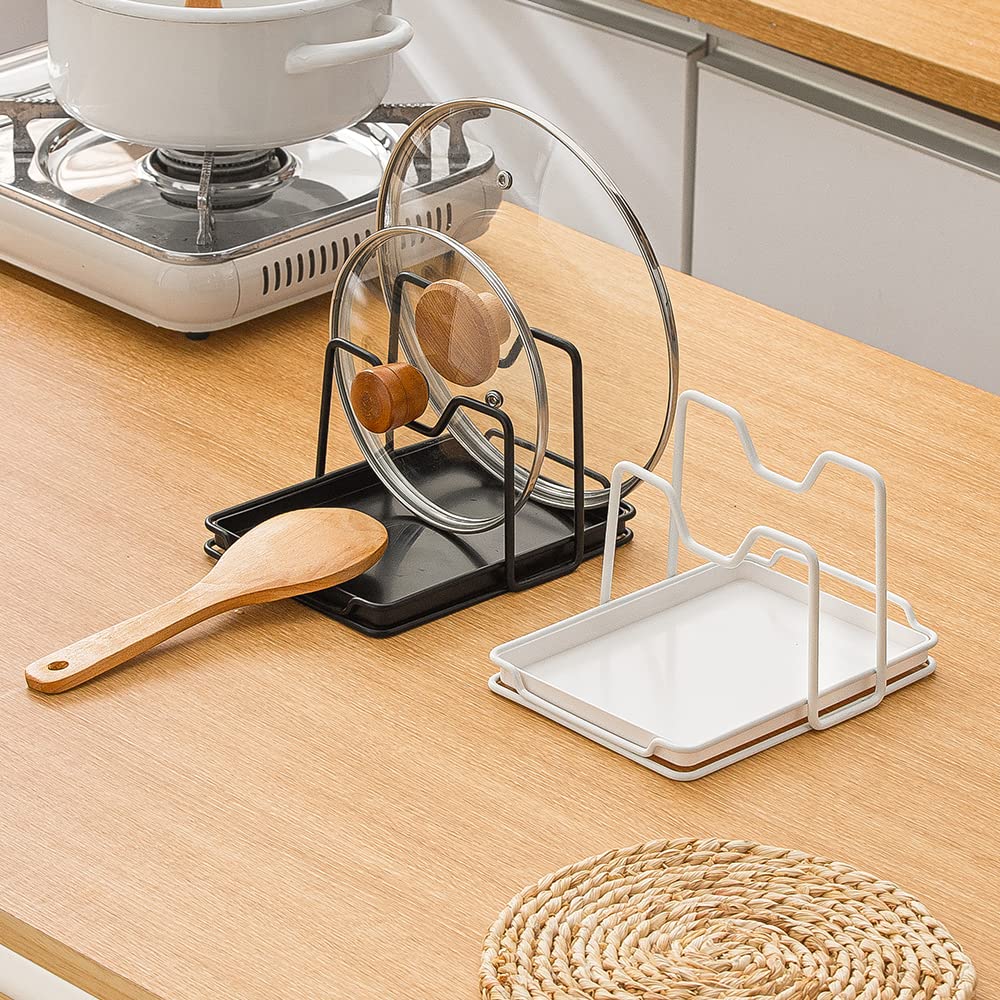 Poeland kitchen organizer holds cutting boards and tools neatly.