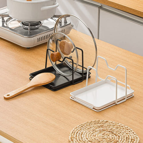 Poeland kitchen organizer holds cutting boards and tools neatly.