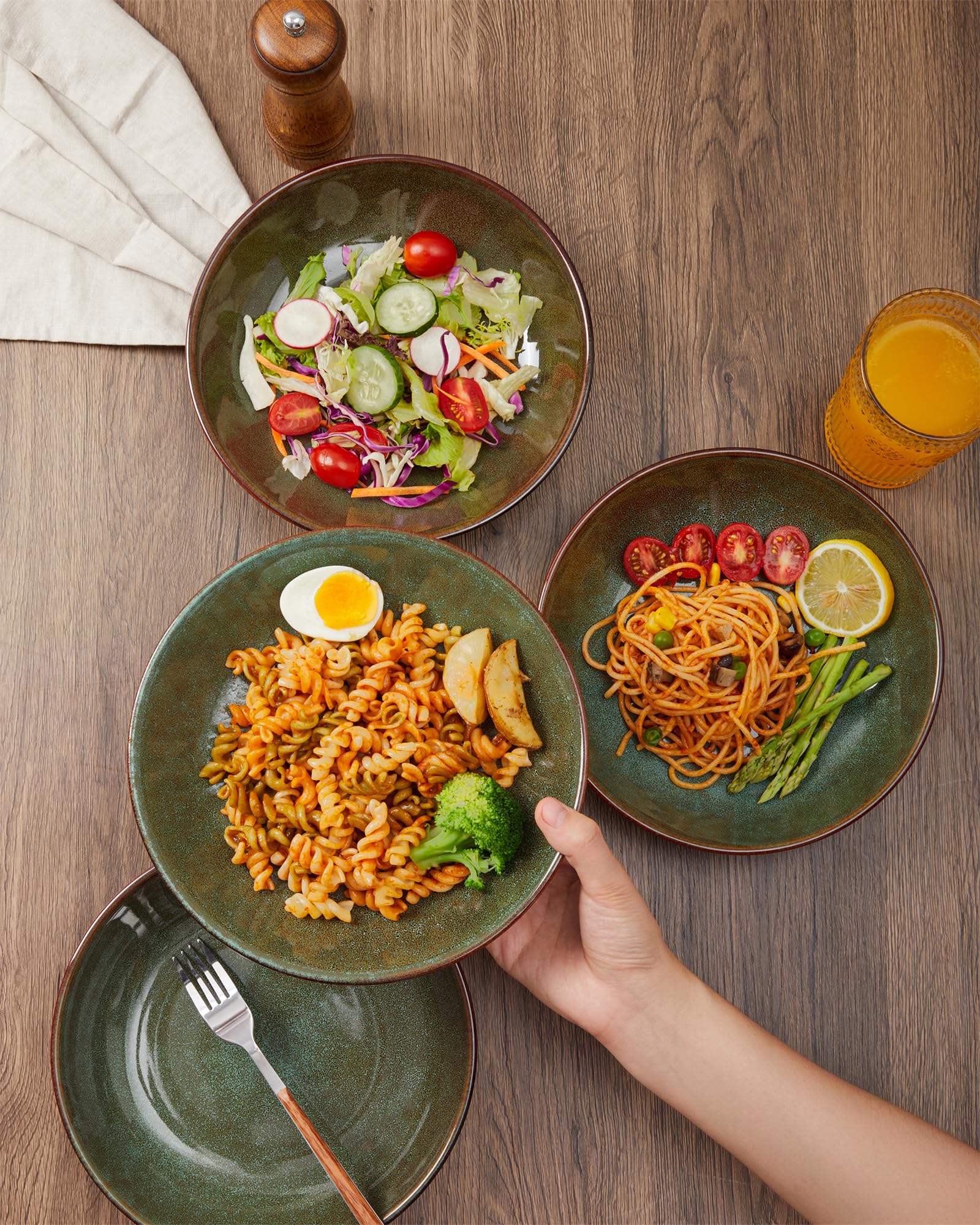 Pokini bowls arranged on a dinner table ideal for pasta, salad, or soup.