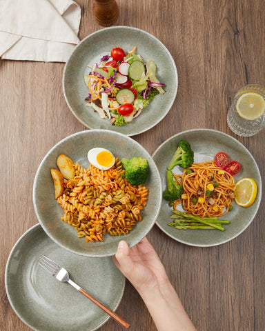 Pokini pasta bowls in use for serving pasta, showcasing generous capacity.