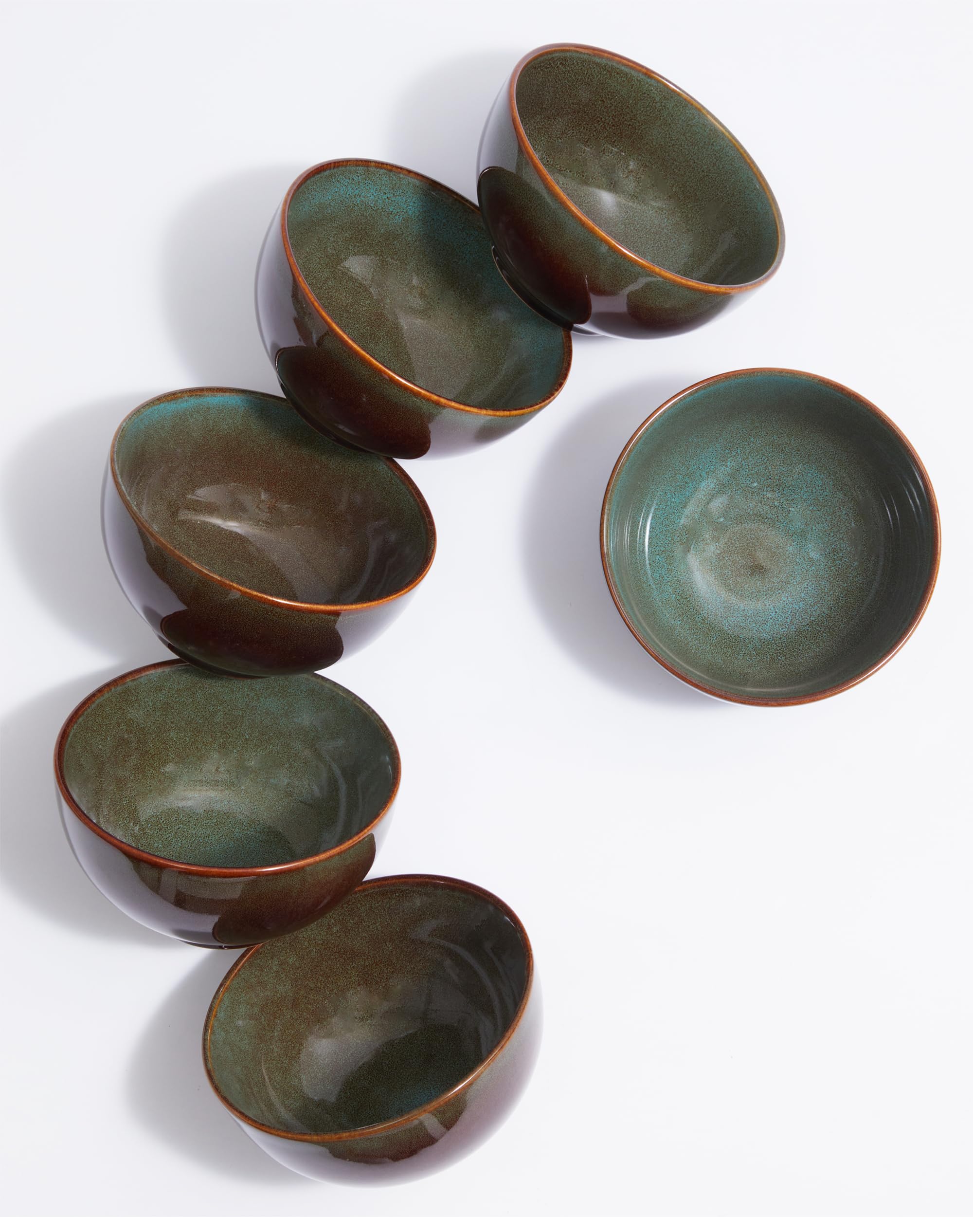 Pokini stoneware bowls stacked in brown and green for space-saving storage