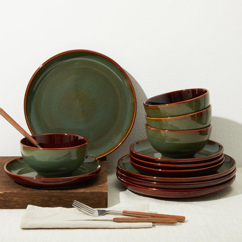 Pokini table setting with sage-green plate and warm rustic vibe