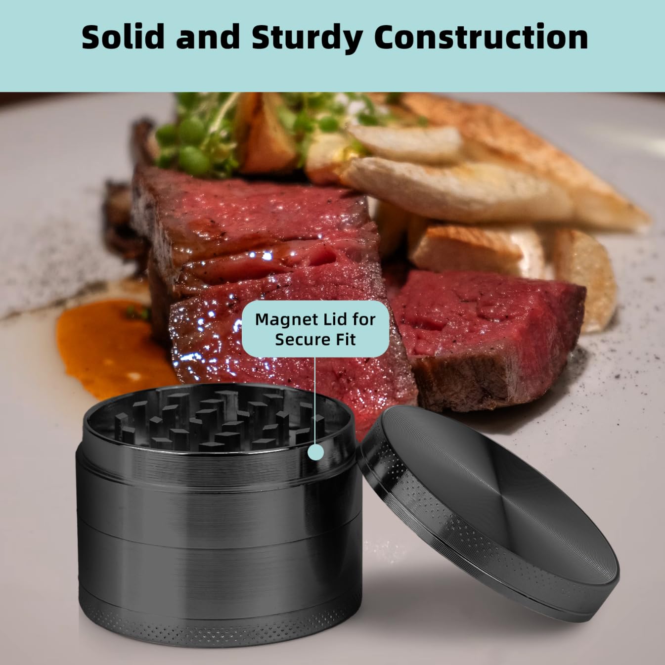 Porsuca Spice Mills Grinder, black, in use for fresh pepper and spice grinding.