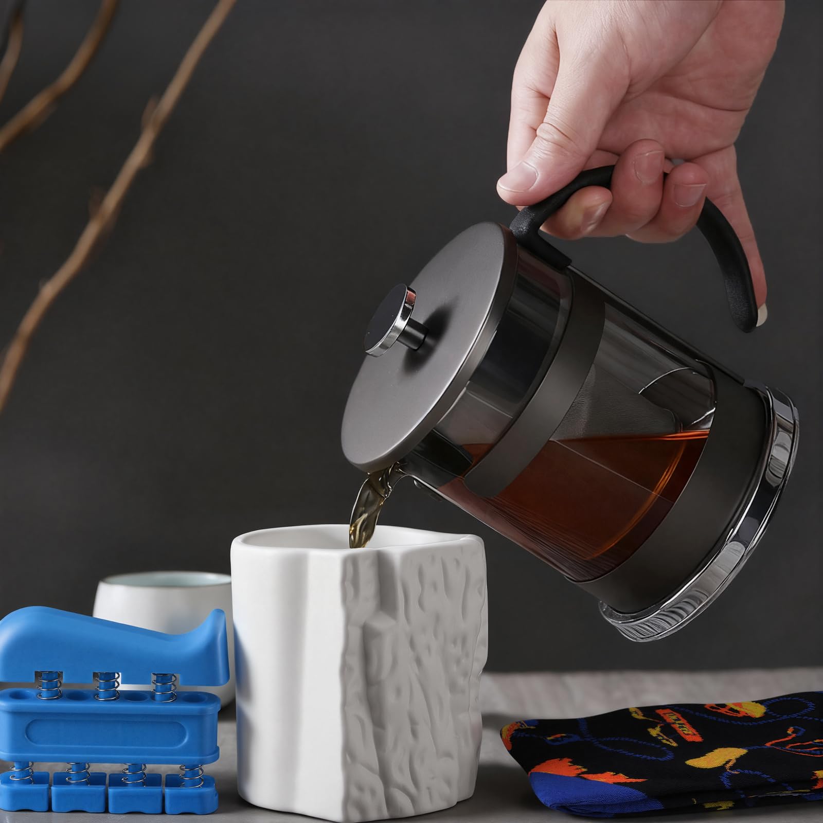 Potchen climber in action using the cup to warm up grip.