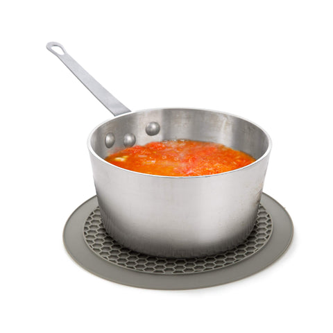 PrepSolutions mat acting as utensil rest on a busy counter