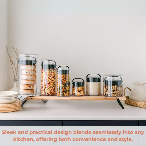 Stainless spoon accessory on Evak Fresh Saver rim for convenient scooping