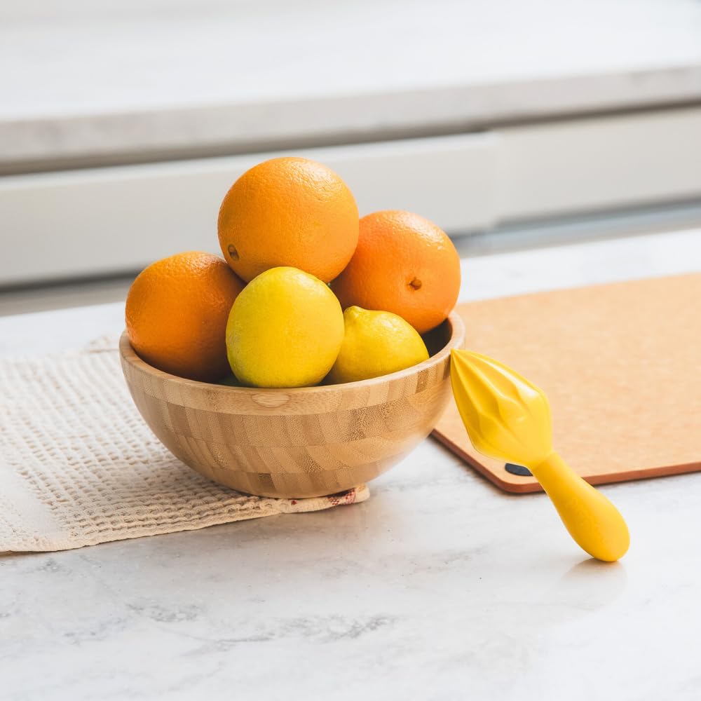 Prepara Juicy Reamer over the pan for quick, mess-free juicing.