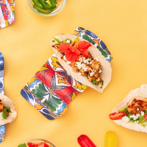 Easy-clean Prepara taco holder in yellow for quick cleanup after meals.