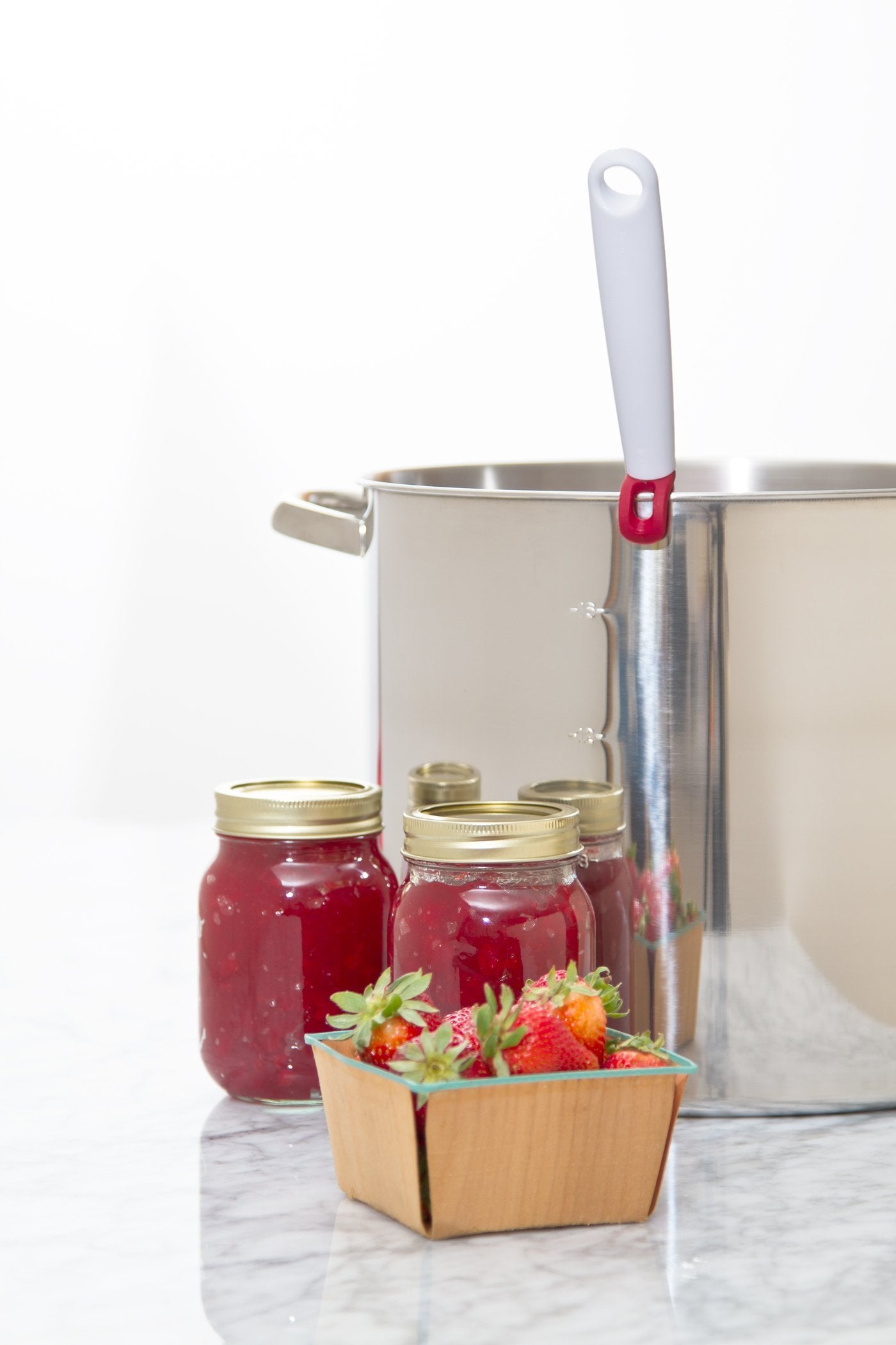 PREPWORKS canning scoop heat resistant to 400°F and dishwasher safe.