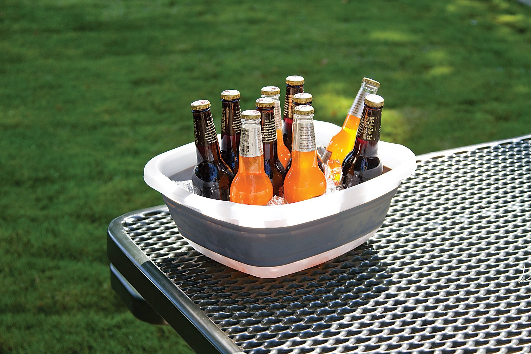 PrepWorks Collapsible Tub used outdoors for camping and picnics.